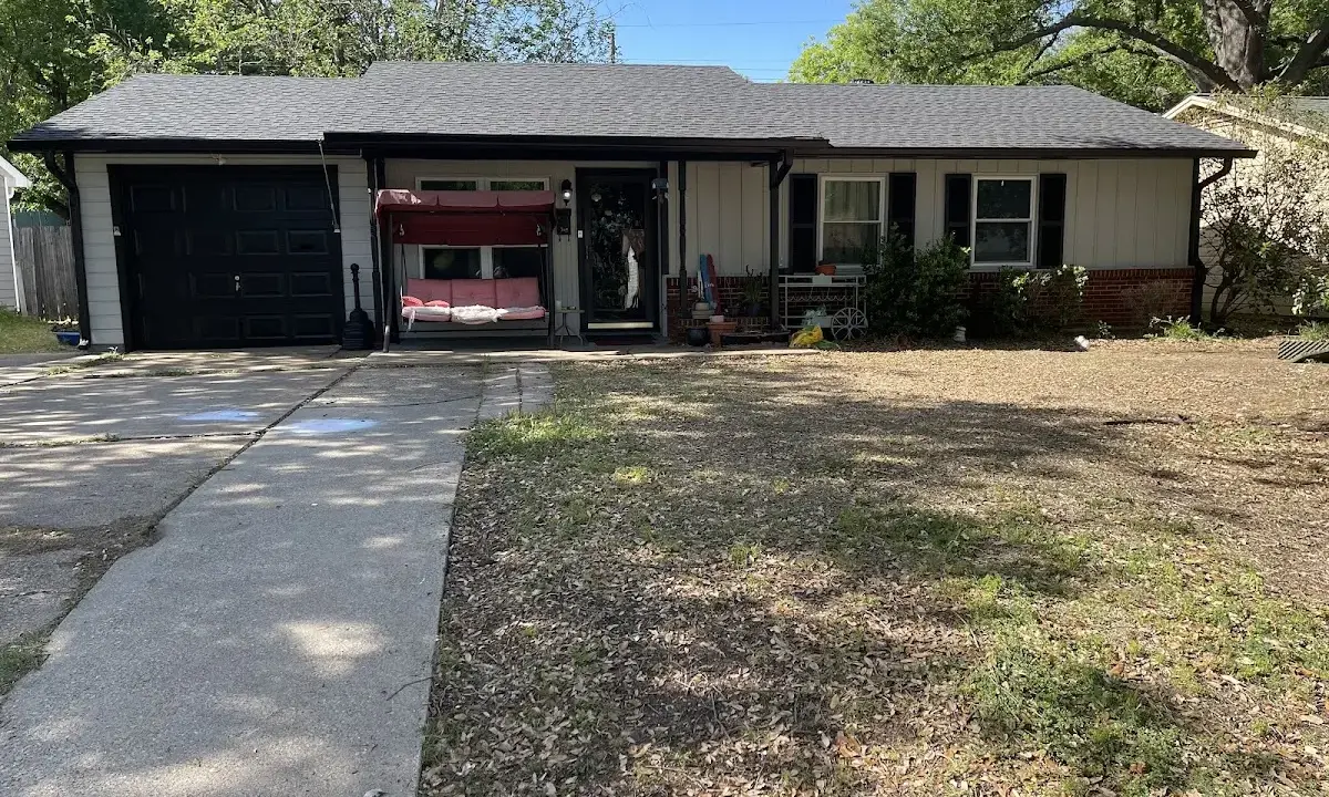 Asphalt Shingle Roof Repair crew at work on a residential roof in Sandersville